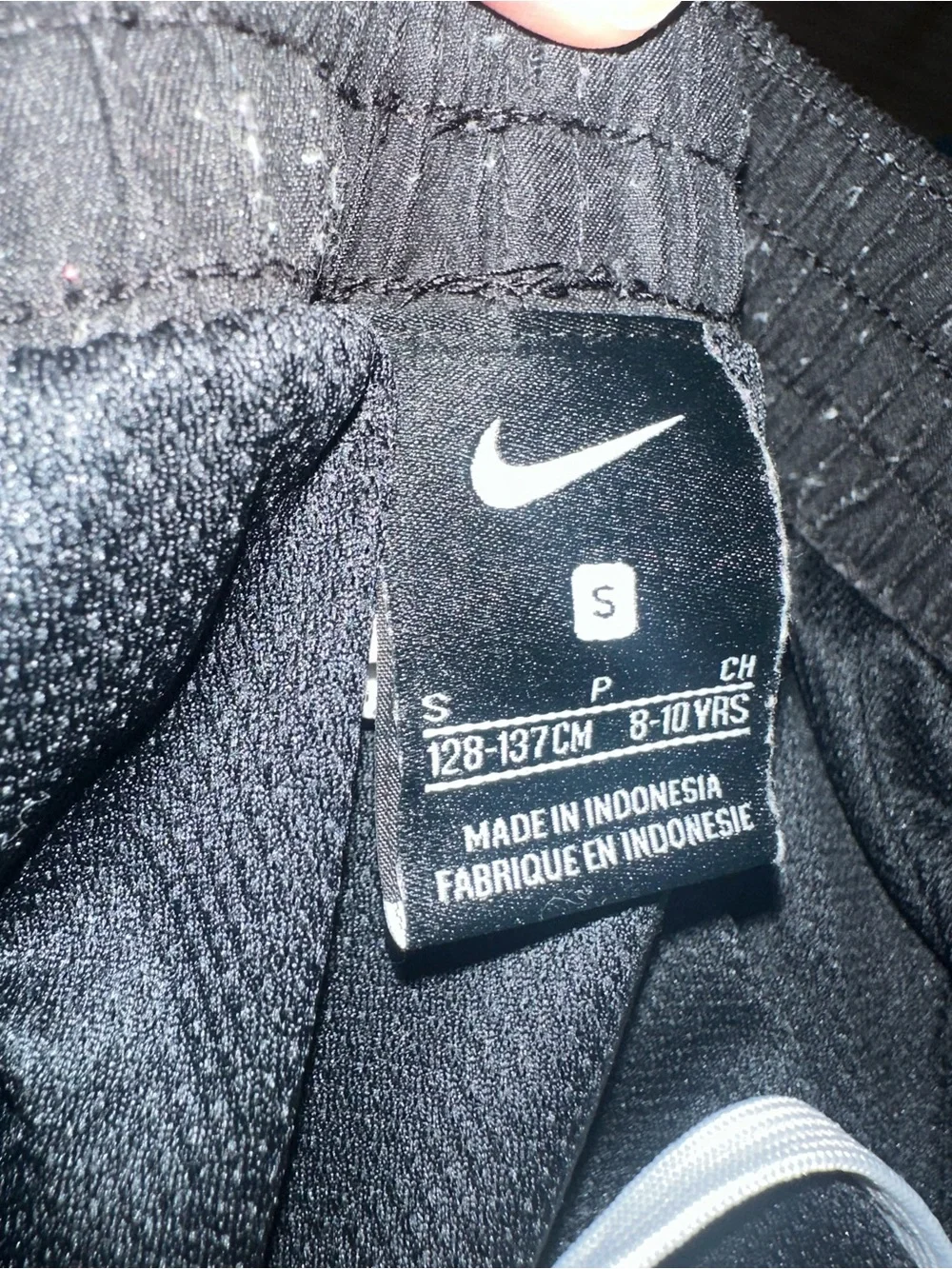 Nike Black Kids Swim Trunks with White Swoosh Logo